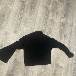 Black XL- long sleeve shirt but runs small so it’s actually like a M